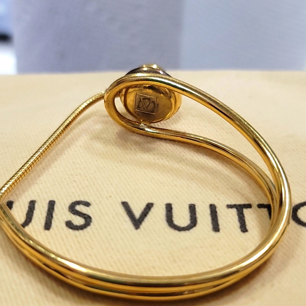 LOUIS VUITTON CELESTE MAGNET GOLD TONE BRACELET - Picture 5 of 16
